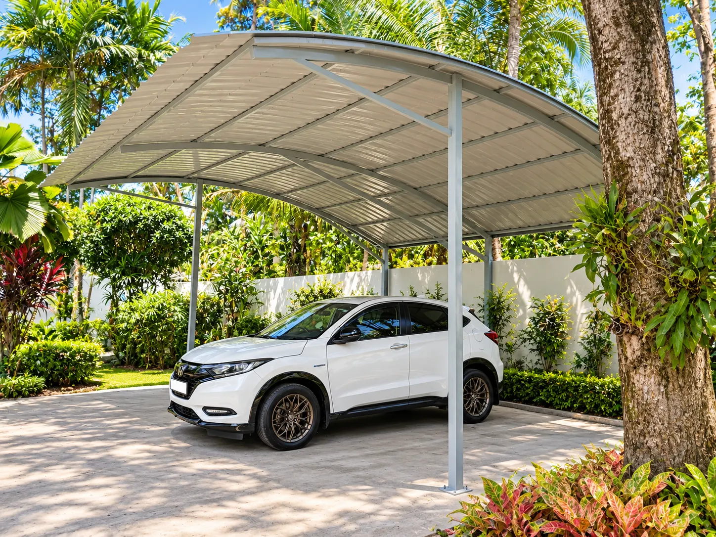 Curved steel carport over a driveway